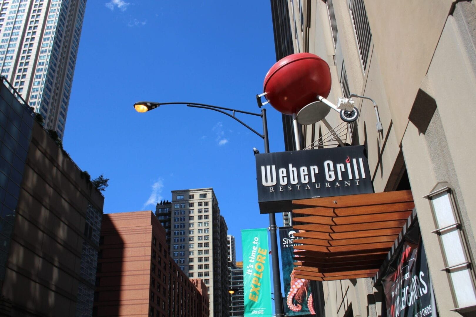 Eating at one of the high top seats that overlook the grills at Weber Grill in Chicago