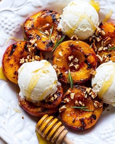 hamburgers, hot dogs, corn, watermelon! grilled peaches with vanilla ice cream and honey! Rainier cherries!