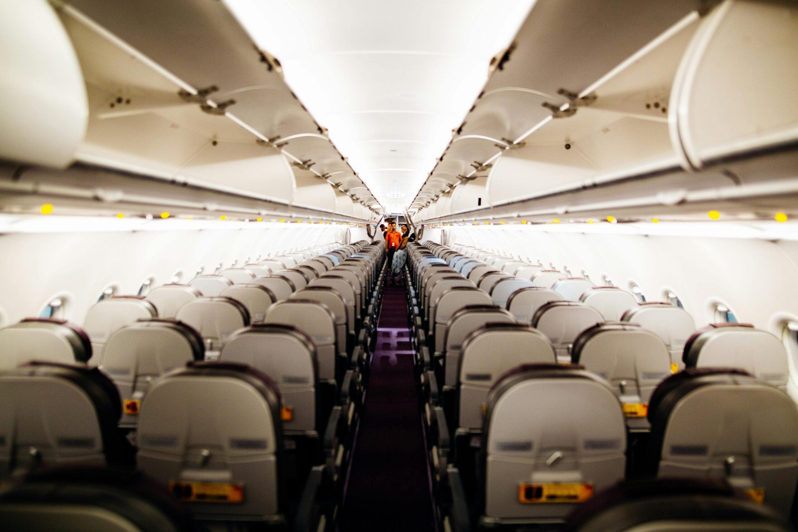 5 Yoga Poses to Practice in a Cramped Airplane Seat