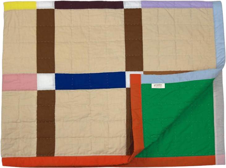 Large hand quilted patchwork bed quilt made from organic cotton