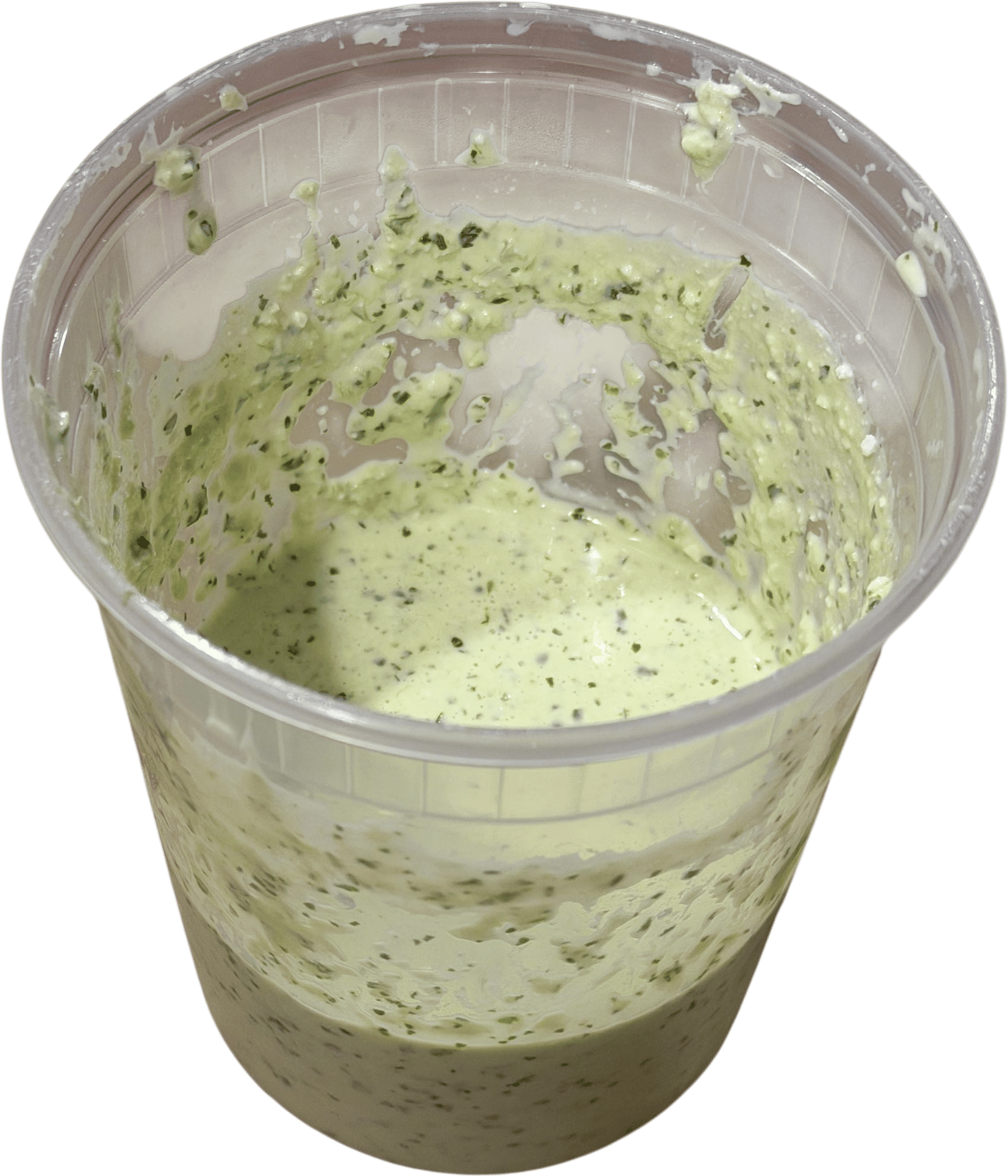 Homemade Aji Verde in a Deli Container