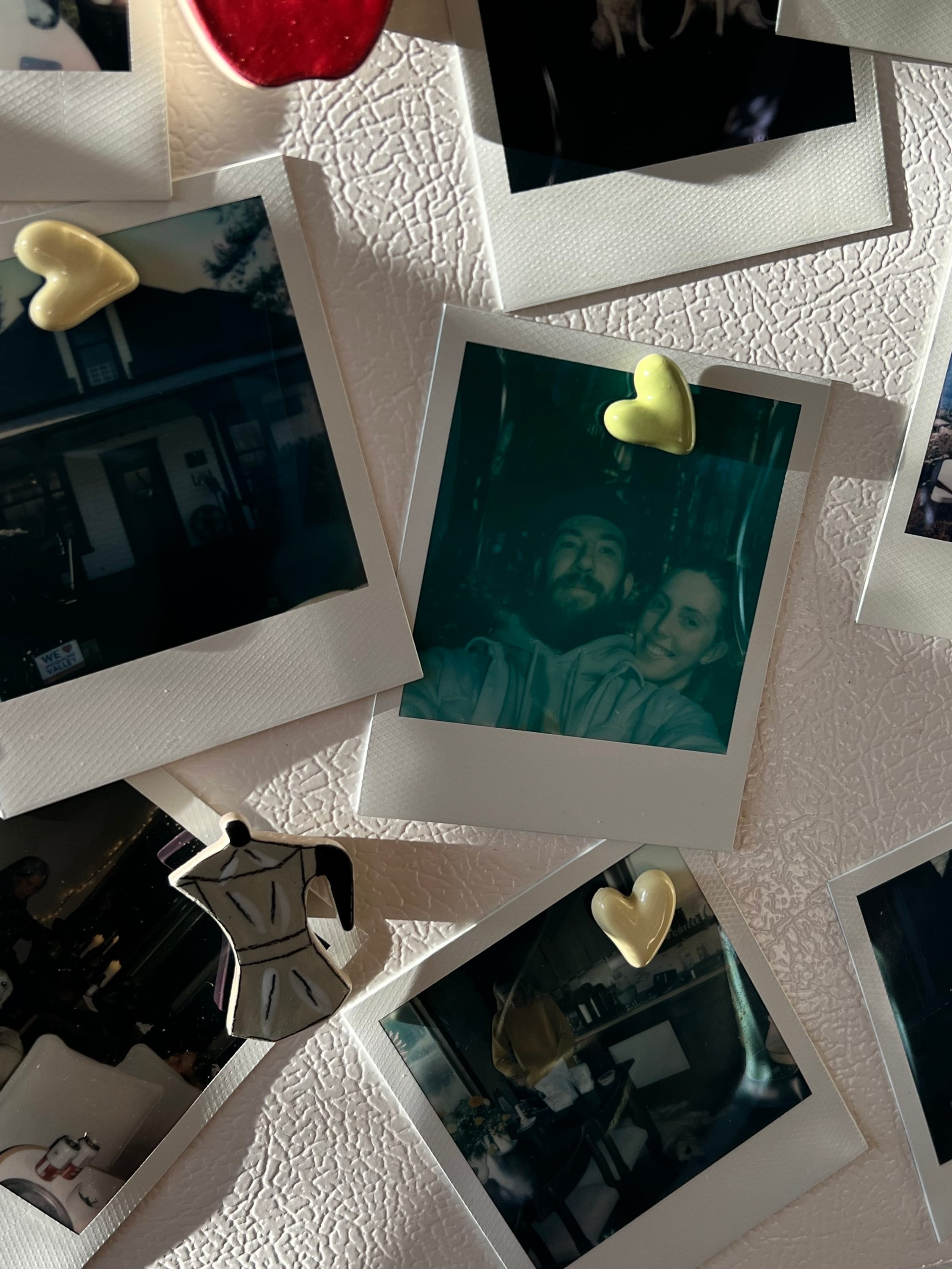 covering your fridge with polaroids