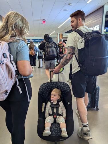 Rolling your baby thru the airport in their travel car seat