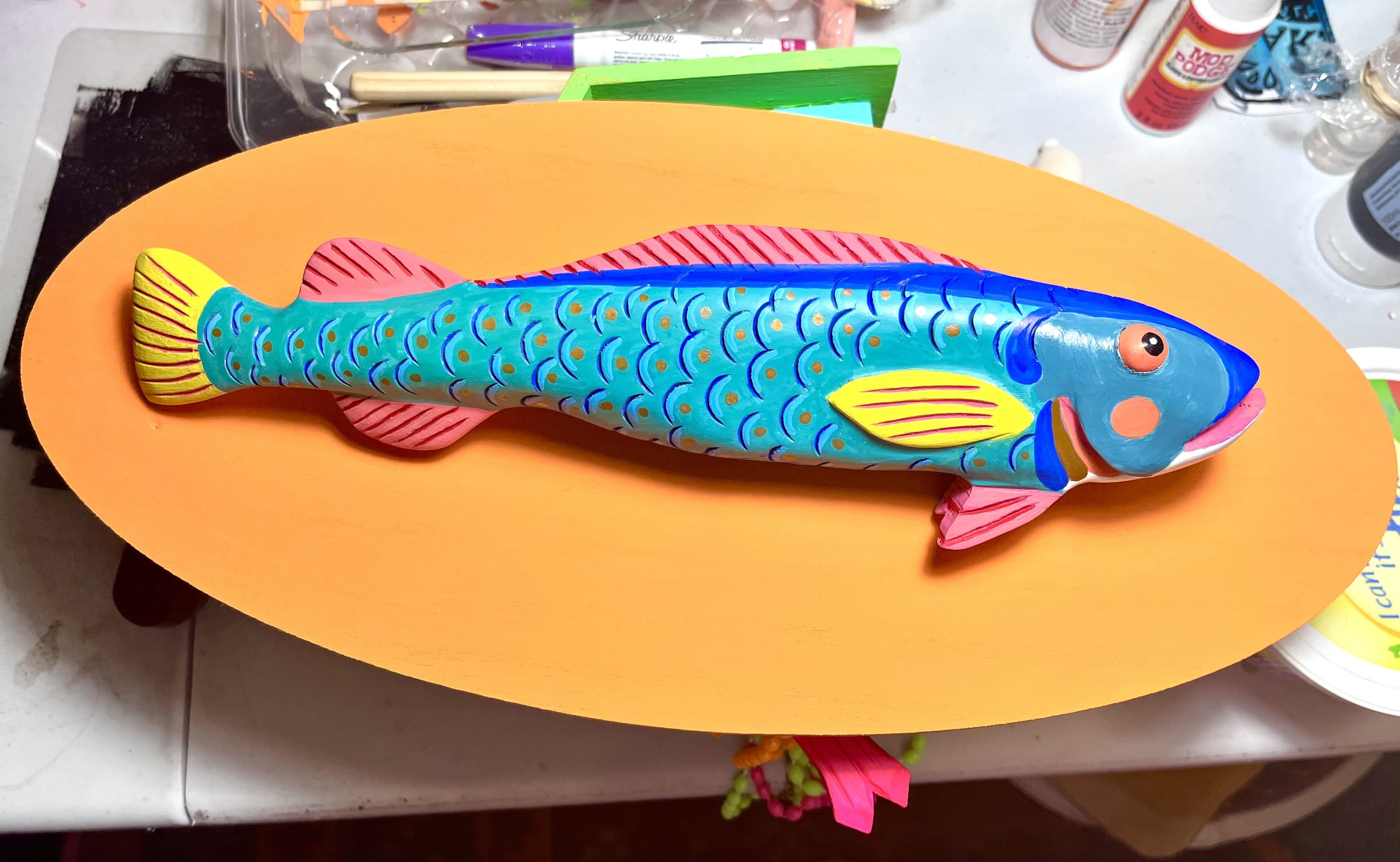 Upcycling thrift store finds to make one of a kind colourful art that makes you smile