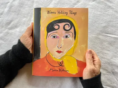 Women Holding Things