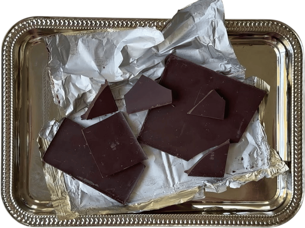 Post-lunch piece of dark chocolate