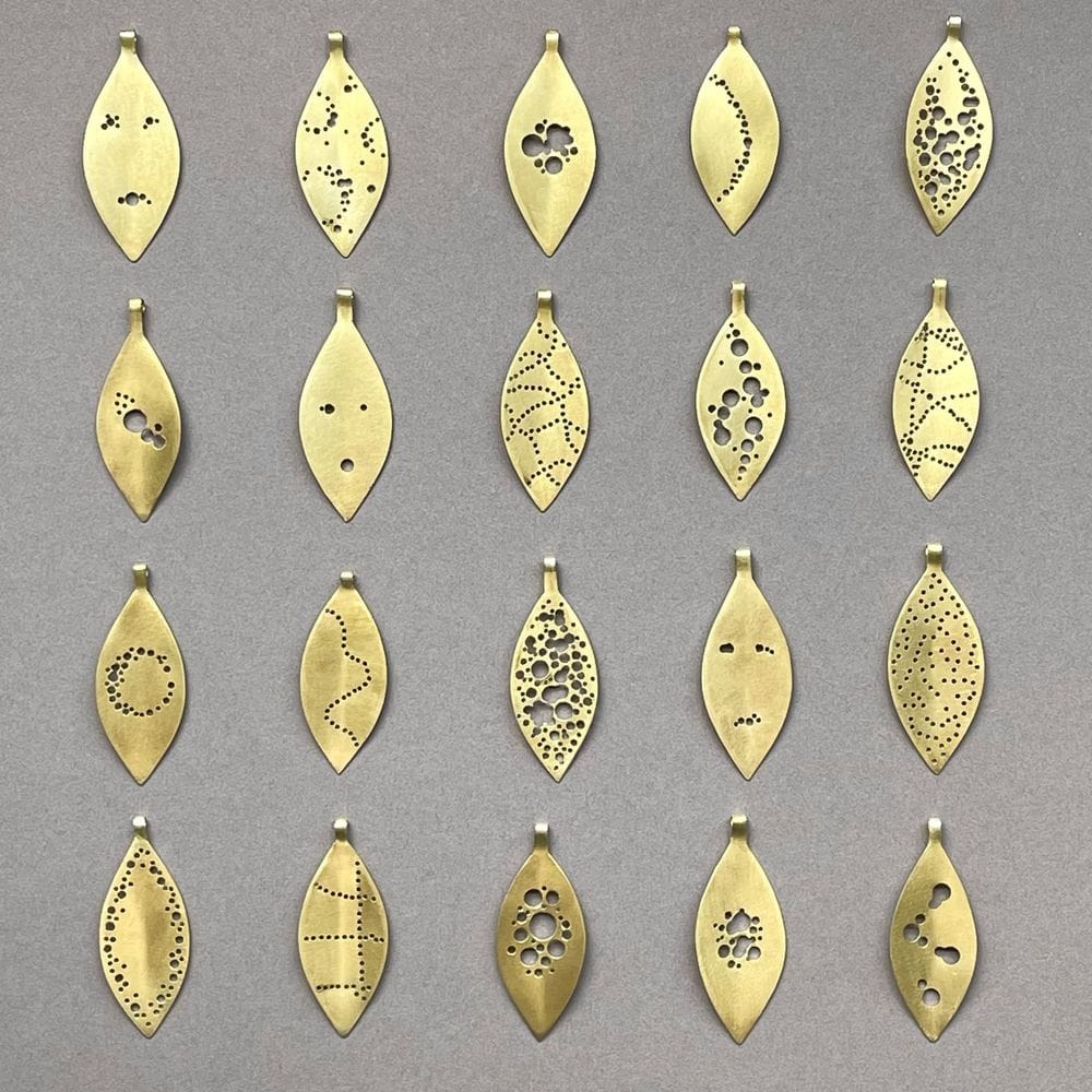 Michael Dumontier "worn leaf" pendants