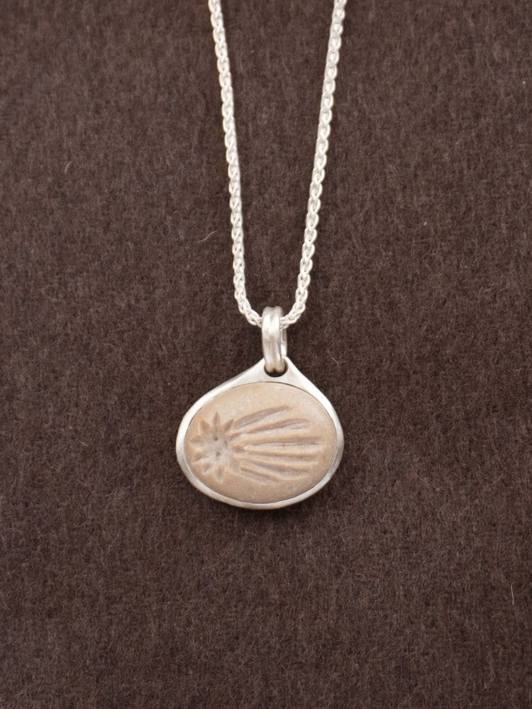 Shooting Star pebble pendant by Lizzie Ames