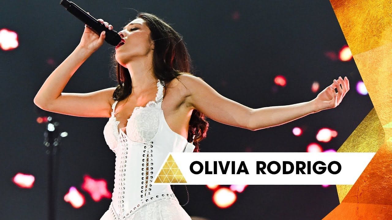 Olivia Rodrigo performing with Robert Smith at Glastonbury