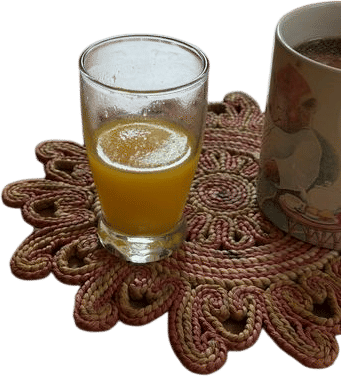 Tiny glass of orange juice