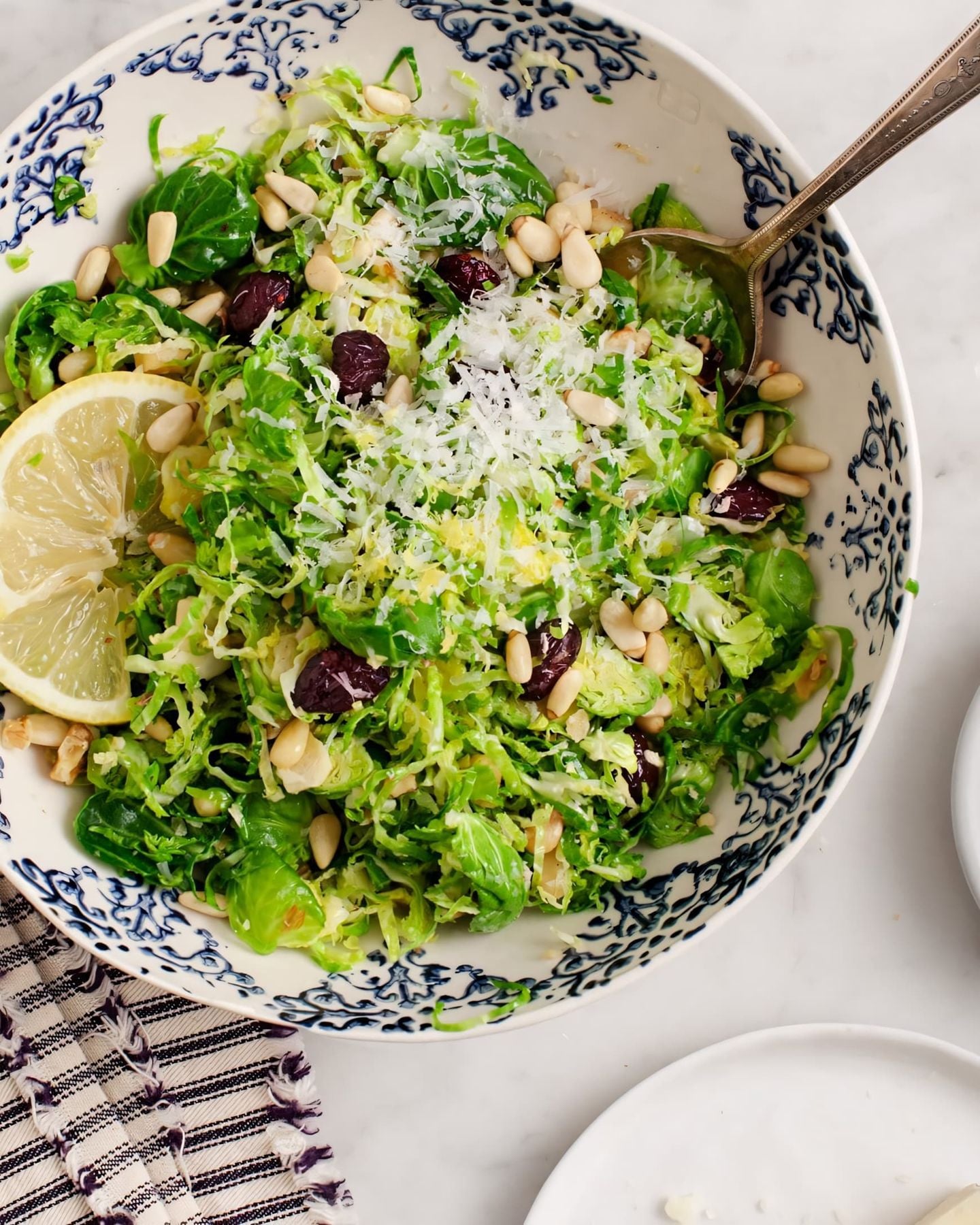 Shaved Brussels Sprout Salad but add pomegranate seeds