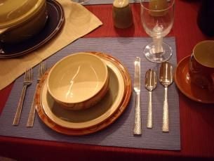 Setting the table before beginning to cook