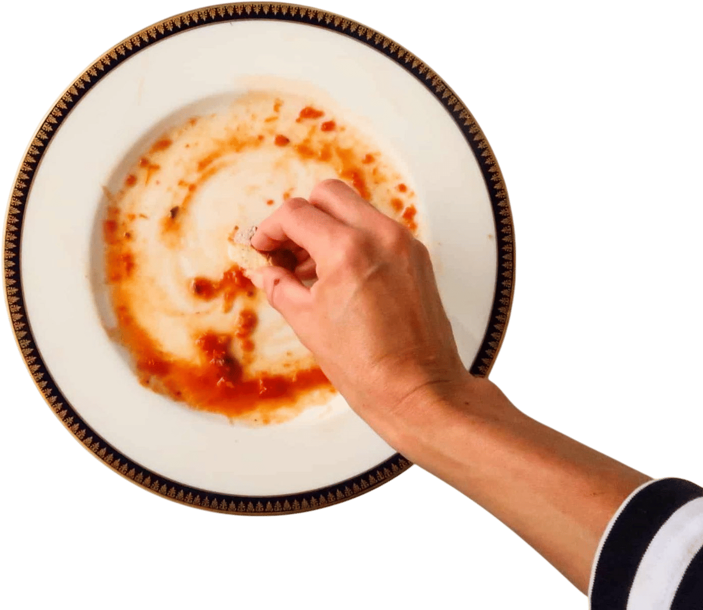 Using bread to sop up leftover sauce