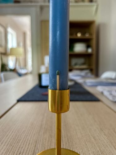 Using a match to stabilize a candlestick