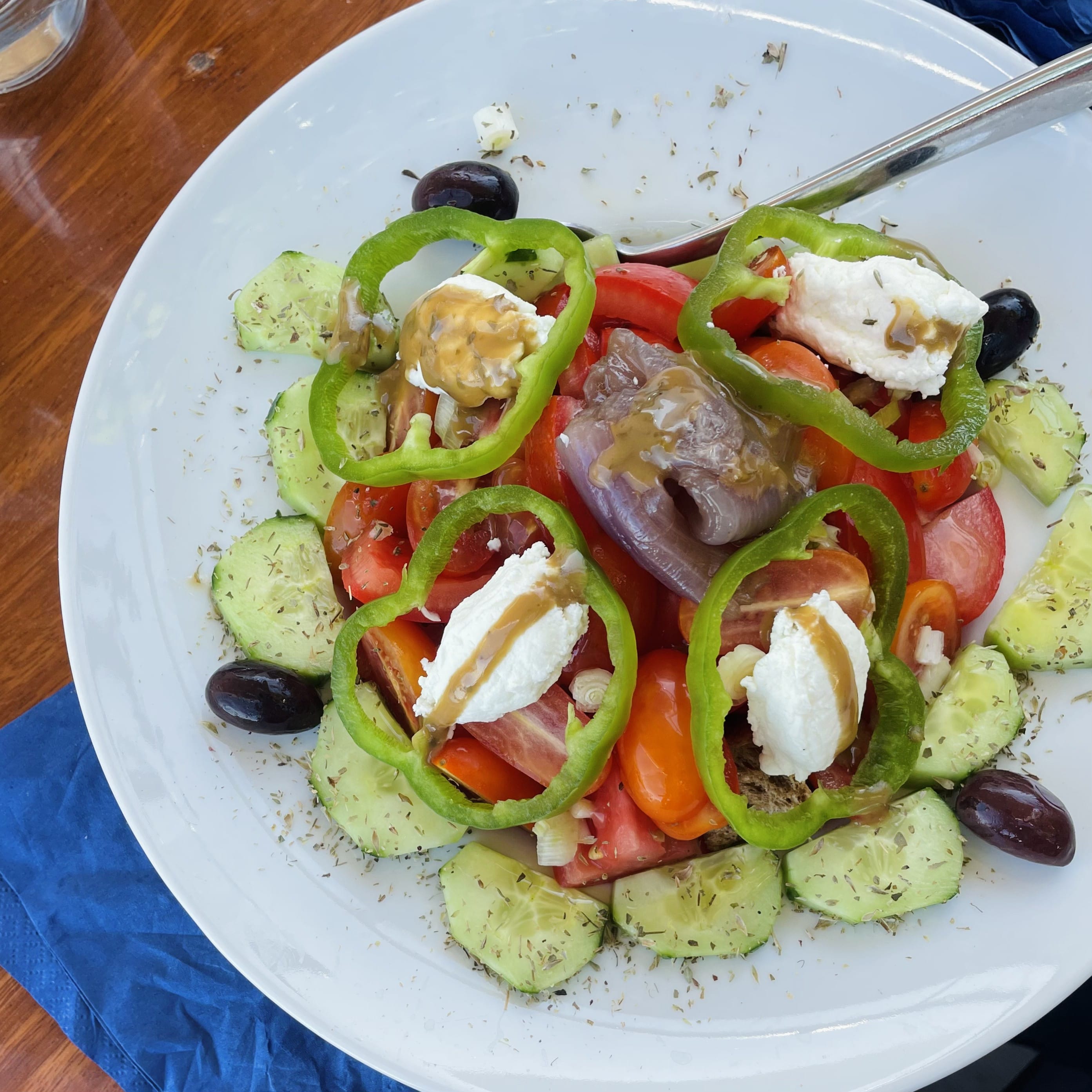 Caramelizing the shallots in your Greek salad