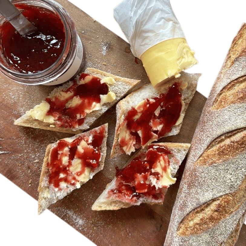 Bread, butter, and raspberry jam