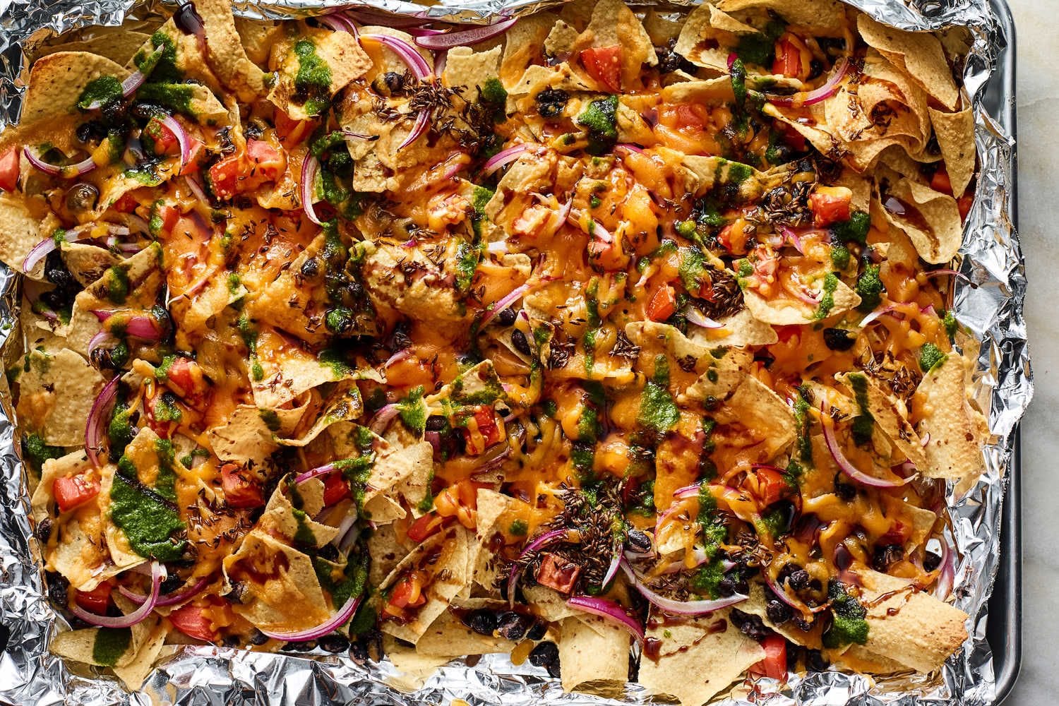 Indian-ish Nachos With Cheddar, Black Beans and Chutney Recipe