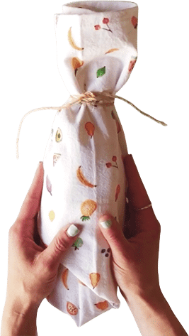 wine wrapped in a tea towel