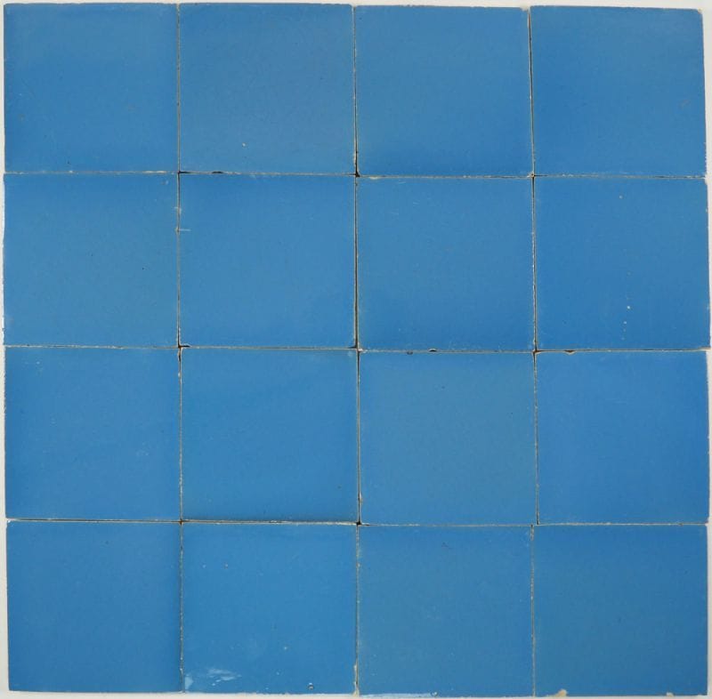 Antique Delft wall tiles in a solid blue colour, 19th - 20th century
