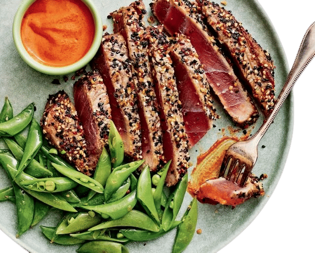 Everything-crusted tuna with snap peas & tahini-jang sauce