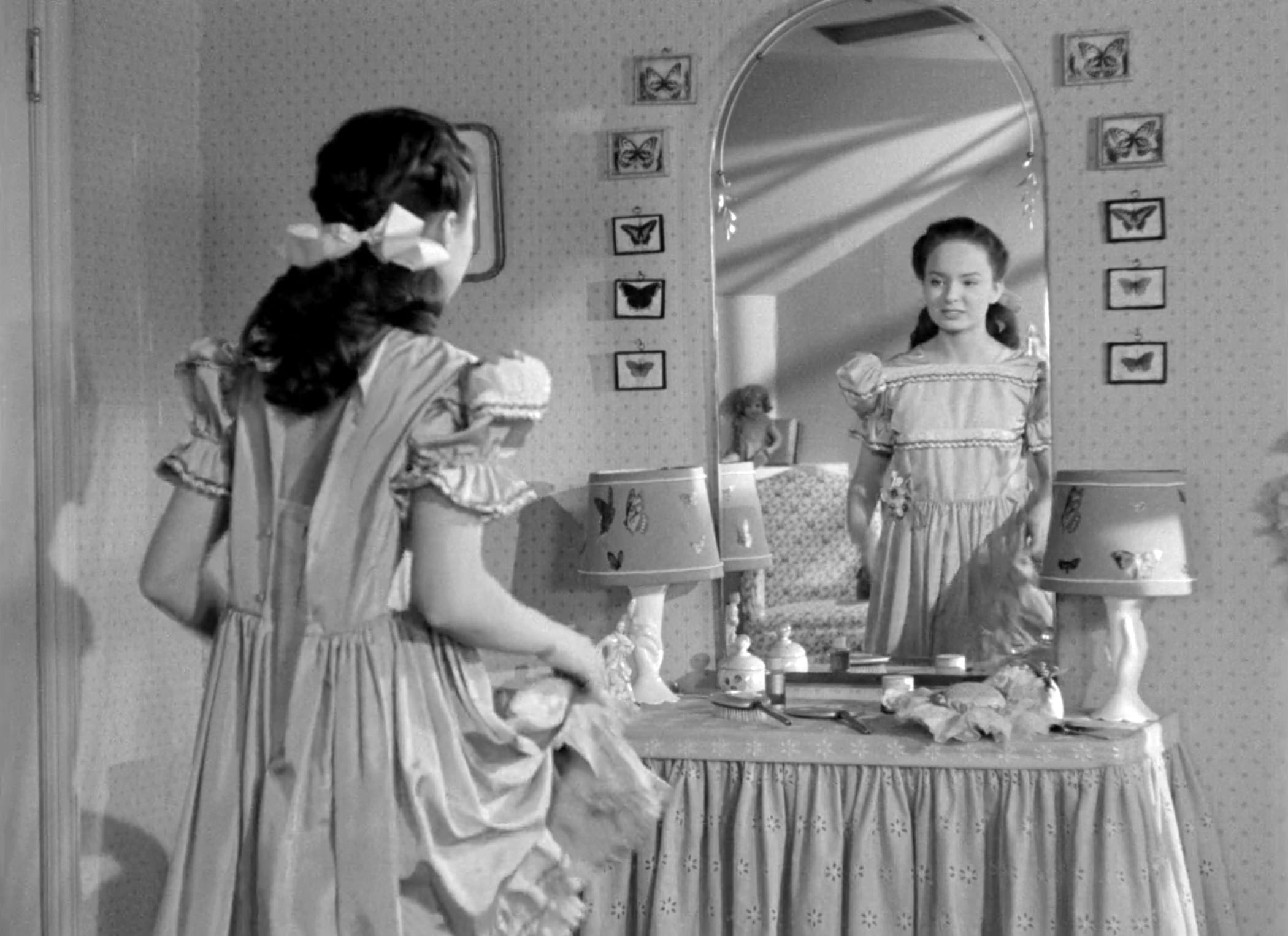 Mildred Pierce: “It’s awful, cheap material. I can tell by the smell.”