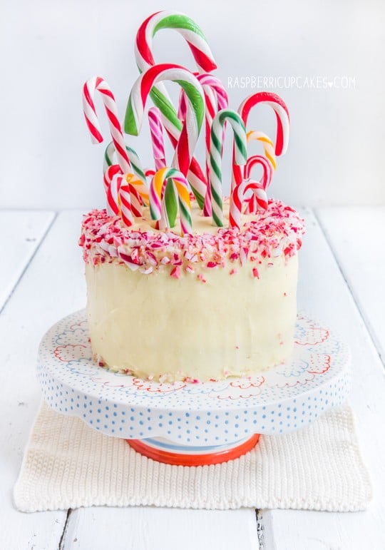 Sticking candy canes in a cake