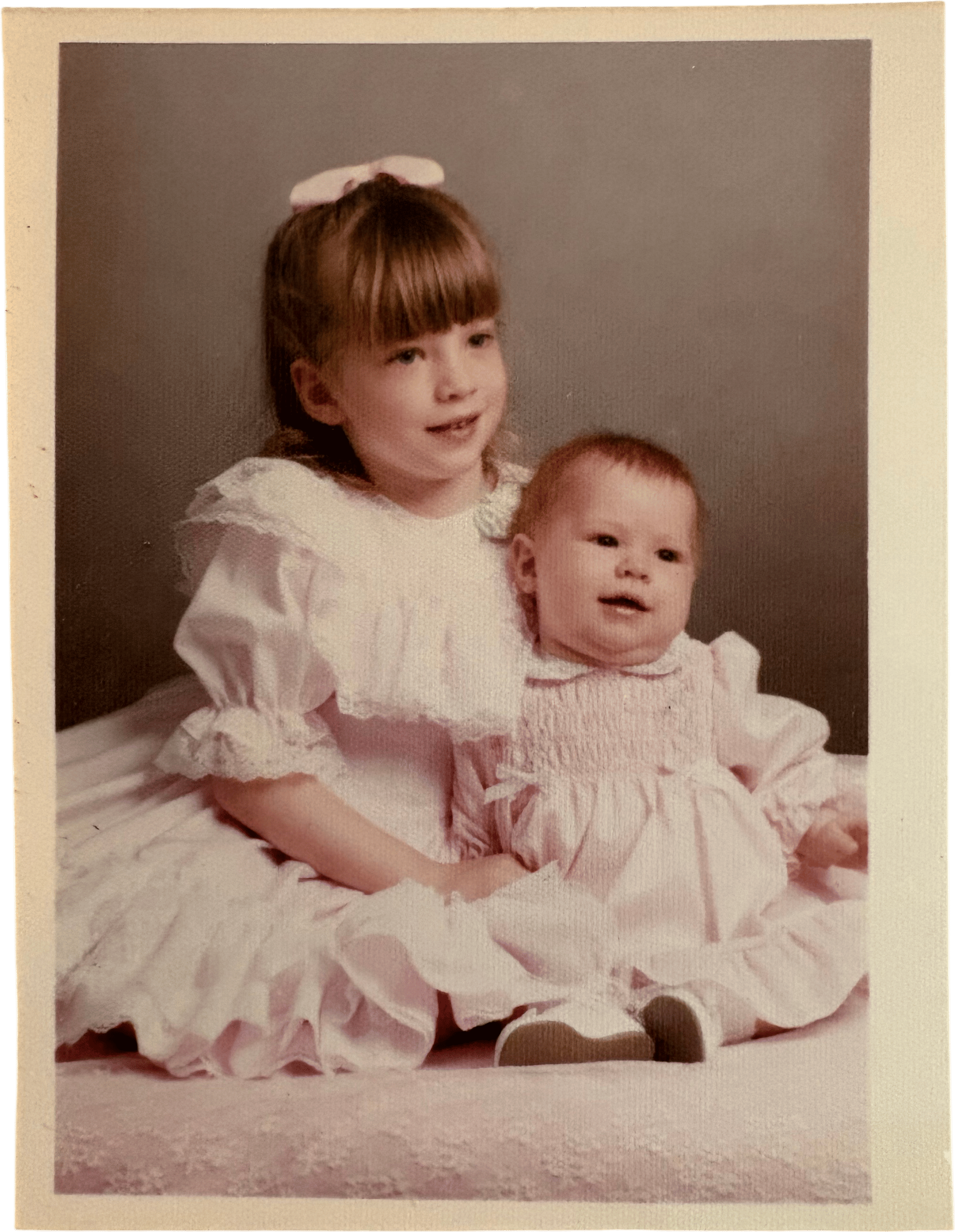 Give your sister a framed photo from when you were little