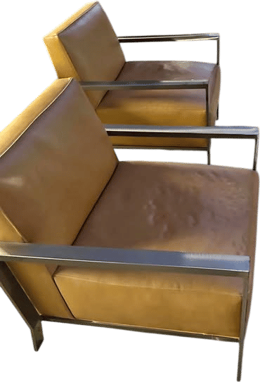 two tan leather and brushed chrome chairs