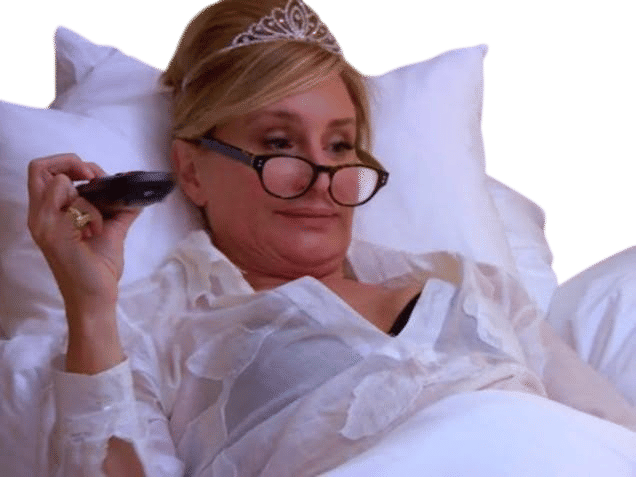 deep conditioning my hair and watching real housewives with cold sparkling water and snacks in bed