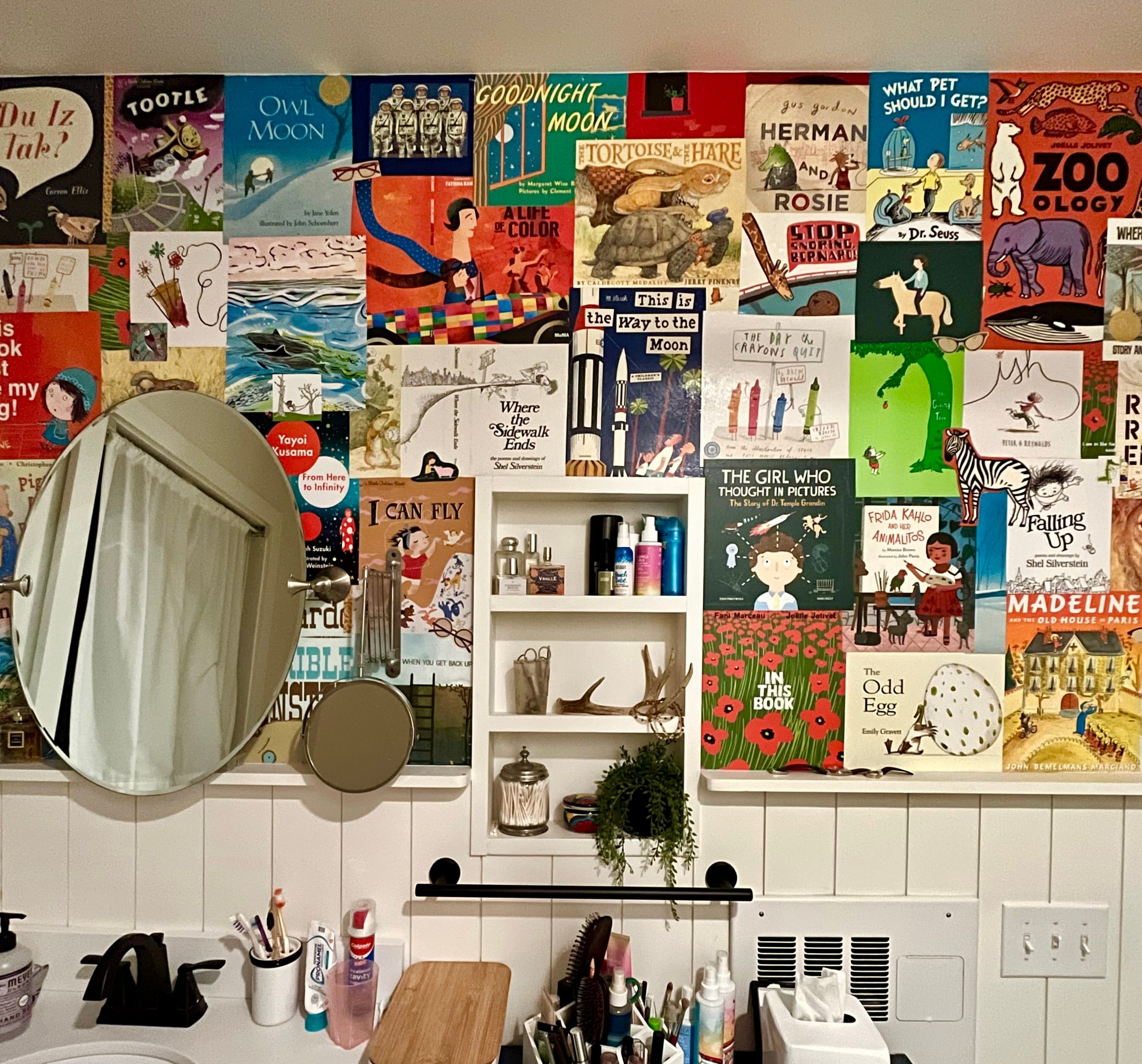 Mod Podge-ing your kids book jackets to a wall