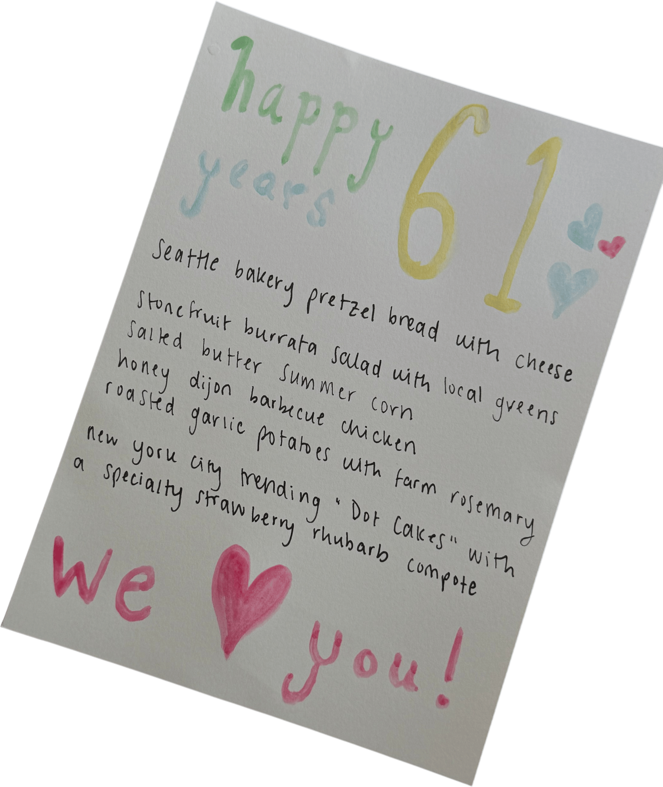 a hand-written menu for dinner celebrations