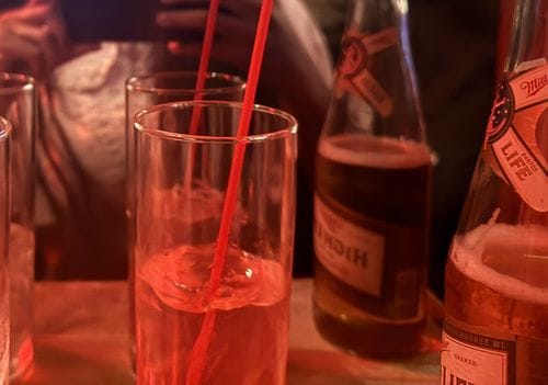 ginger beer with a dash of cranberry juice