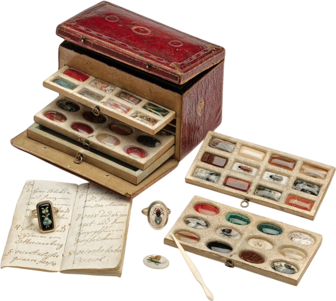 Kunstkammer Georg Laue on Instagram: "(1/3) Its little gold-tooled morocco leather case identifies this ring stone cabinet as a precious ‘lithoteque’ in a format suggesting personal use. Its hybrid character as a scientific collection, on the one hand, and as a fashion accessory intended for use in a flirtatious context on the other is confirmed by the catalogue included with the collection and the fire-gilt silver rings with which the cabochon-cut stones, all fifty of them, can be tried out on the recipient‘s finger. Remarkably, the case along with the complete set of cabochon-cut gemstones, two rings, the original bone implement for removing stones from the box and the catalogue included with them are all intact. This last was drawn up by the gem cutter who was responsible for this artwork: Heinrich Gottlob Lang (1739–1809), who was active in Augsburg in the third quarter of the eighteenth century. Only a few ring stone cabinets of his are extant in public collections and in private hands.
@tefaf
Court ring stone cabinet
Made by the Saxon gemstone cutter Heinrich Gottlob Lang (1739-1809)
Augsburg, ca 1770
Two rings of fire-gilt silver, 50 carved and polished gemstones, leather case, handwritten booklet
Height 8 cm, width 13 cm, 7 cm
#kunstkammergeorglaue #georglaue #wondersarecollectable #kunstkammer #wunderkammer #cabinet #cabinetmaking #cabinetofcuriosities #cabinetdecuriosities #oddities #curiosities #renaissance #baroque #antiques #artcollector #collectingart #collector #artificialia #tefaf"