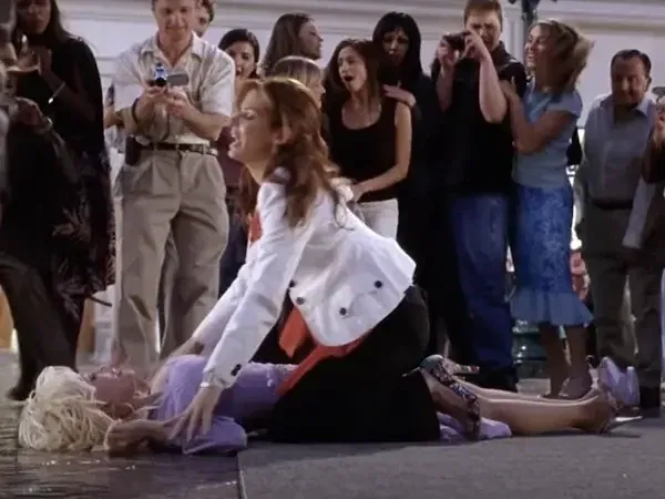 Sandra Bullock tackling Dolly Parton in Miss Congeniality 2: Armed and Fabulous