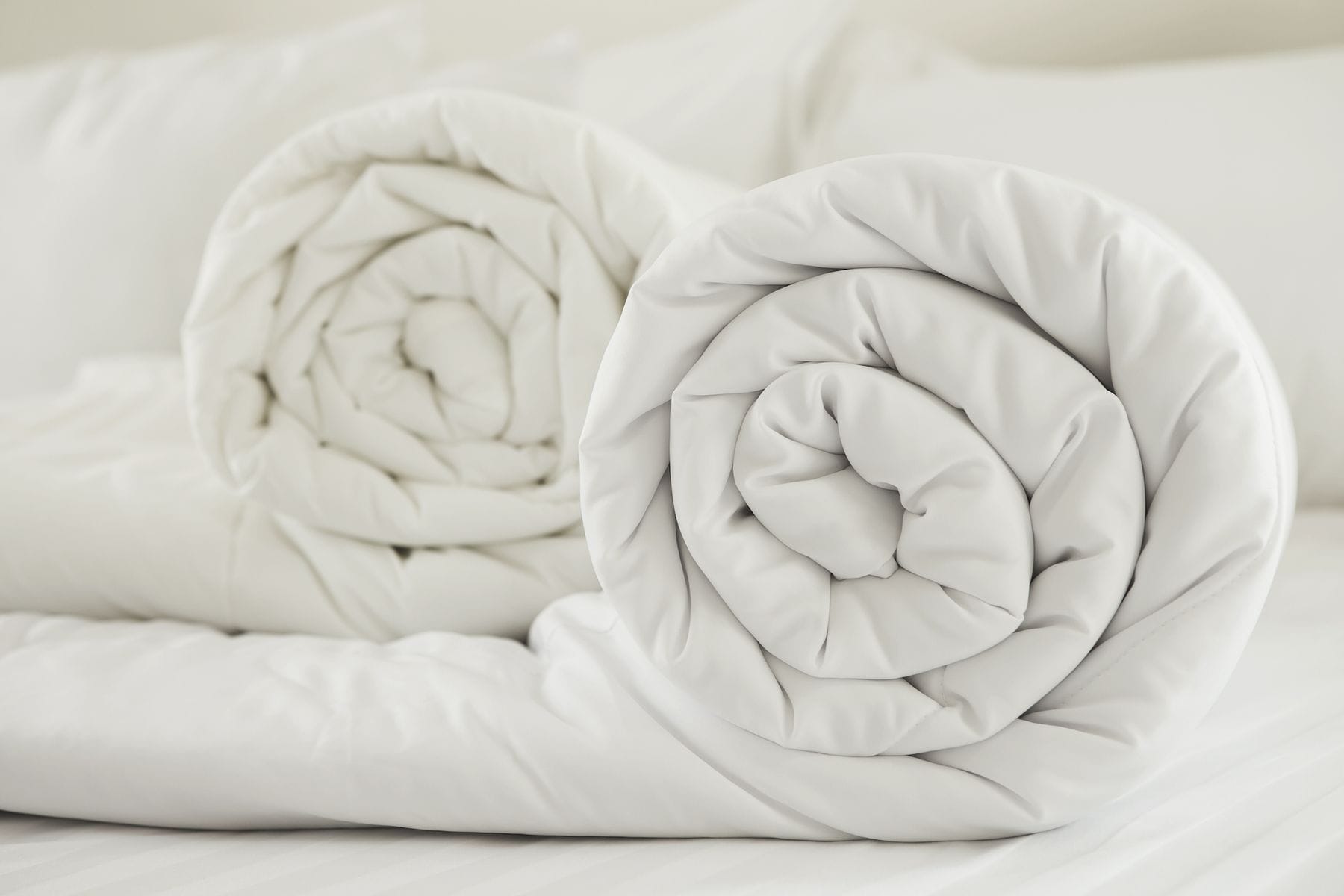 Each partner having their own comforter in bed