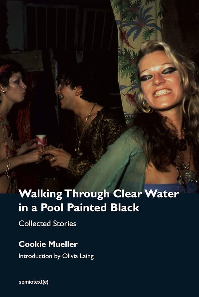 walking through water in a pool painted black