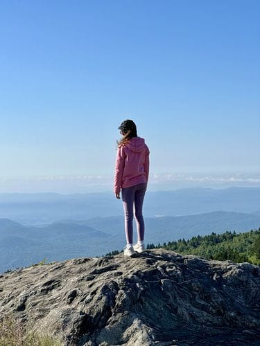 Take a kid to the top of a mountain
