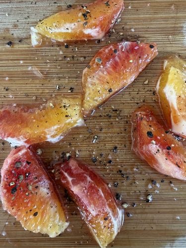 blood oranges with cracked pepper and flaky salt