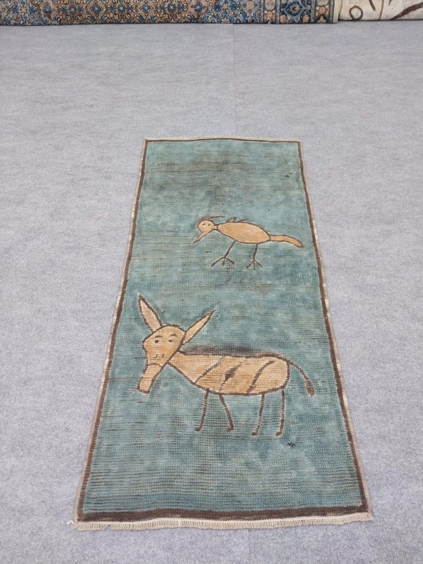 Handmade Turkish Animal Motif Rug (2x4 Ft)