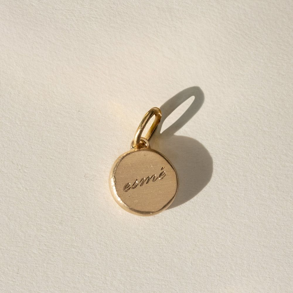 Melt 3g of family gold into an engraveable charm.