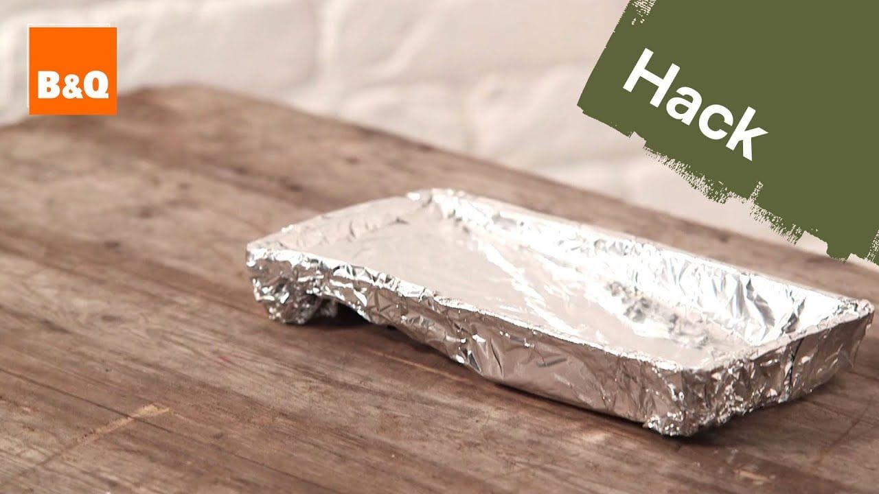 Cover paint tray with foil for easier cleaning