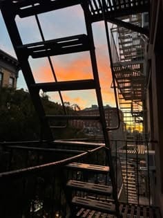 Fire escape at sunset and a bottle of wine never failed me