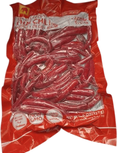 A bag of frozen Thai chili peppers in the freezer