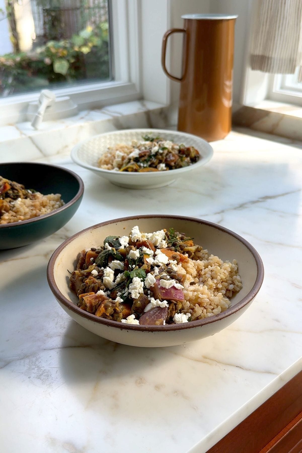 Creamy leek and squash lentil bowl with cinnamon tahini dressing