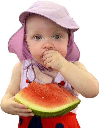 toddlers eating watermelon