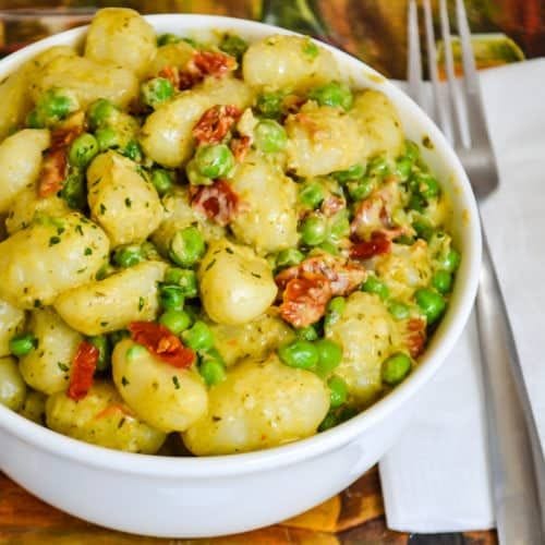 Creamy Pesto Gnocchi with Sun Dried Tomatoes & Peas