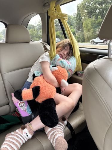 Take pics of your kids sleeping in the car