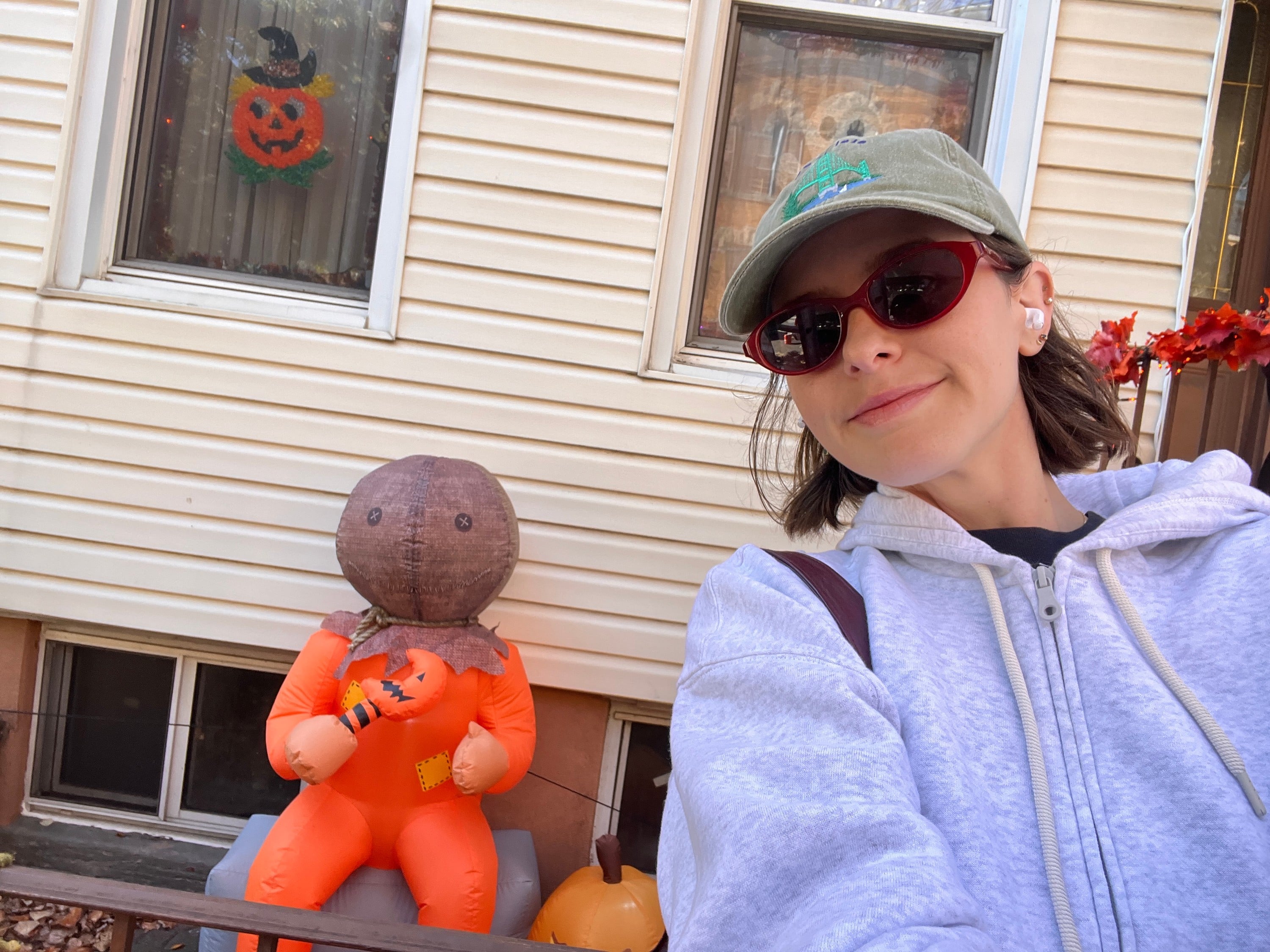 posing with halloween decor