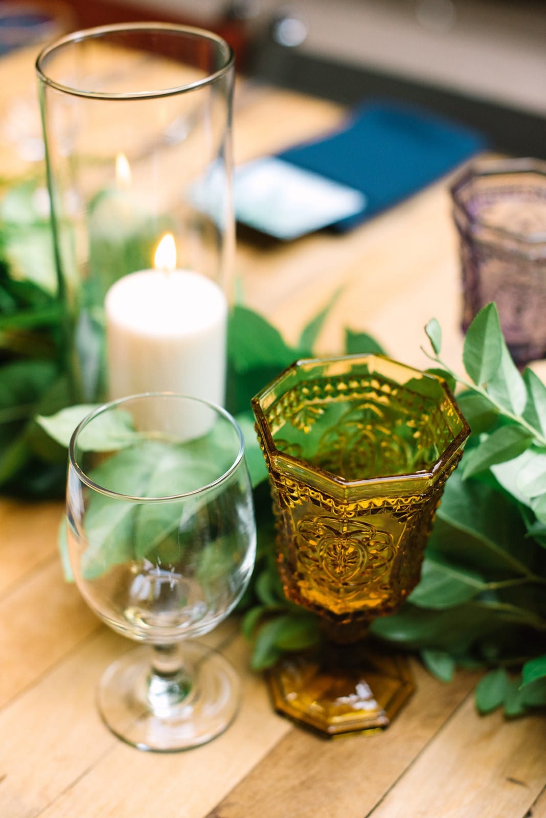Greenery > florals on the tables 