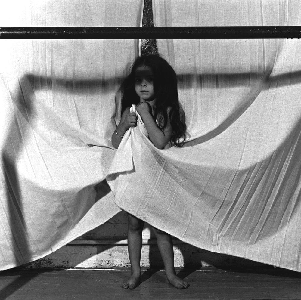 Girl Holding Sheet (1978)